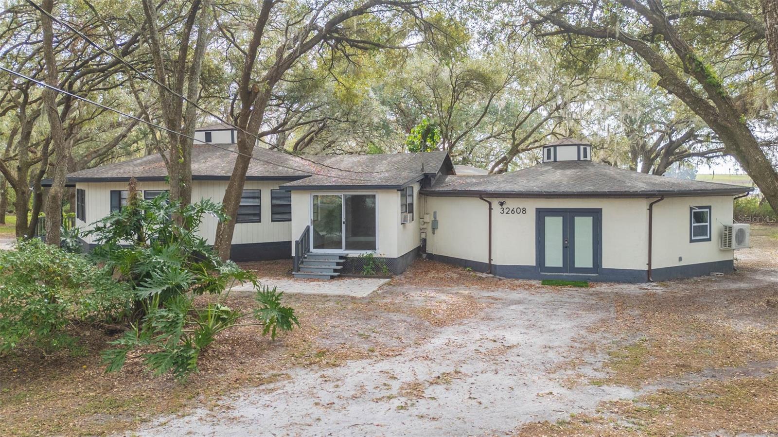 Primary room's office with access to the front of the property