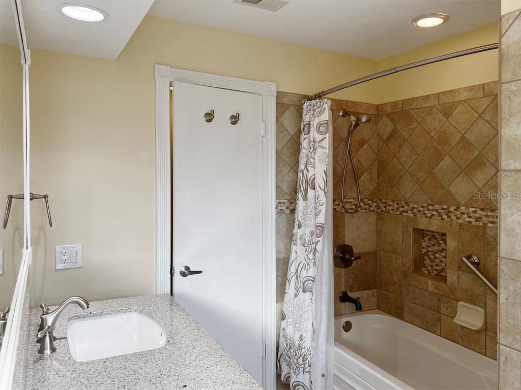 Hall bathroom, tub and shower