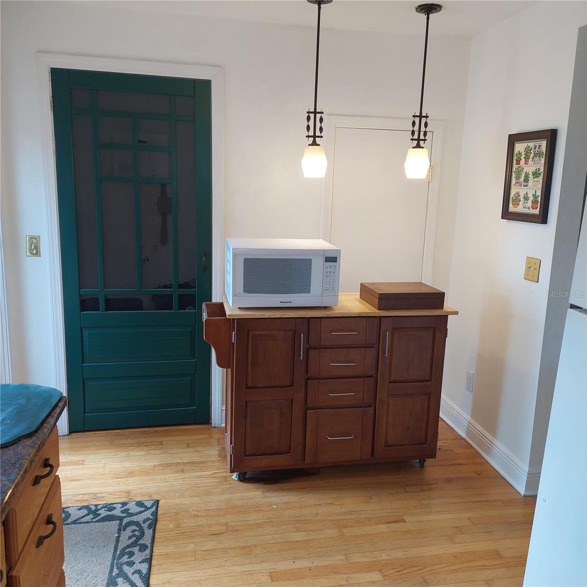 pantry space behind the green door