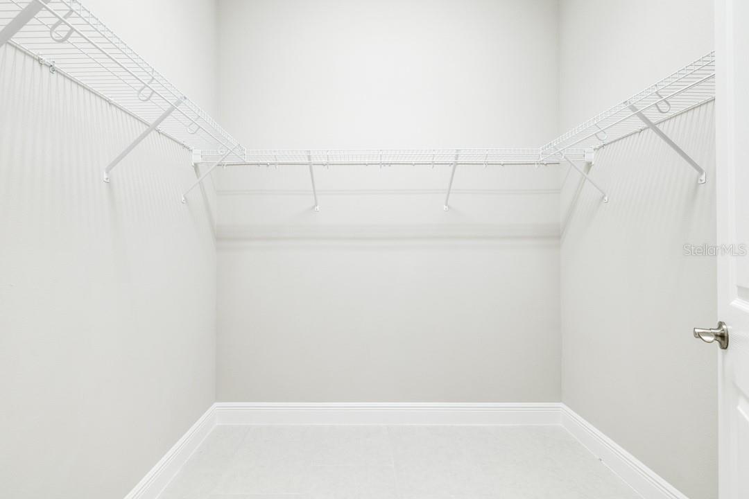 One of Two Walk-In Closets