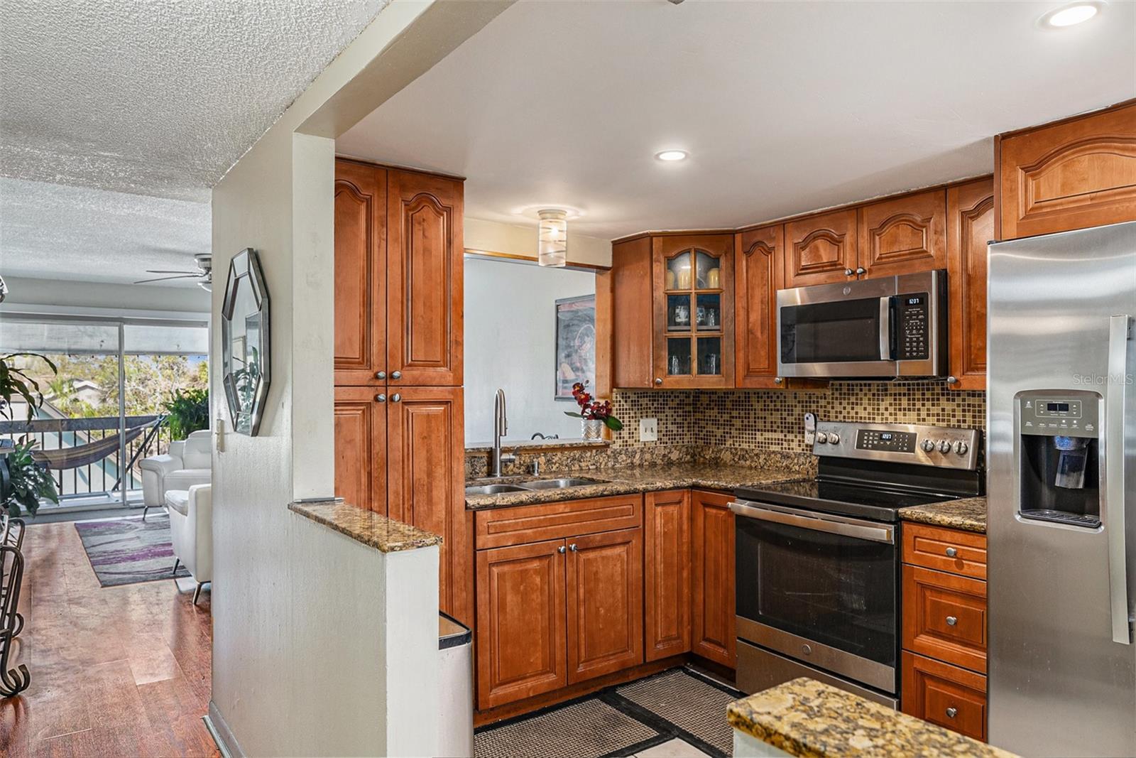 Real wood cabinets with plenty of storage space.