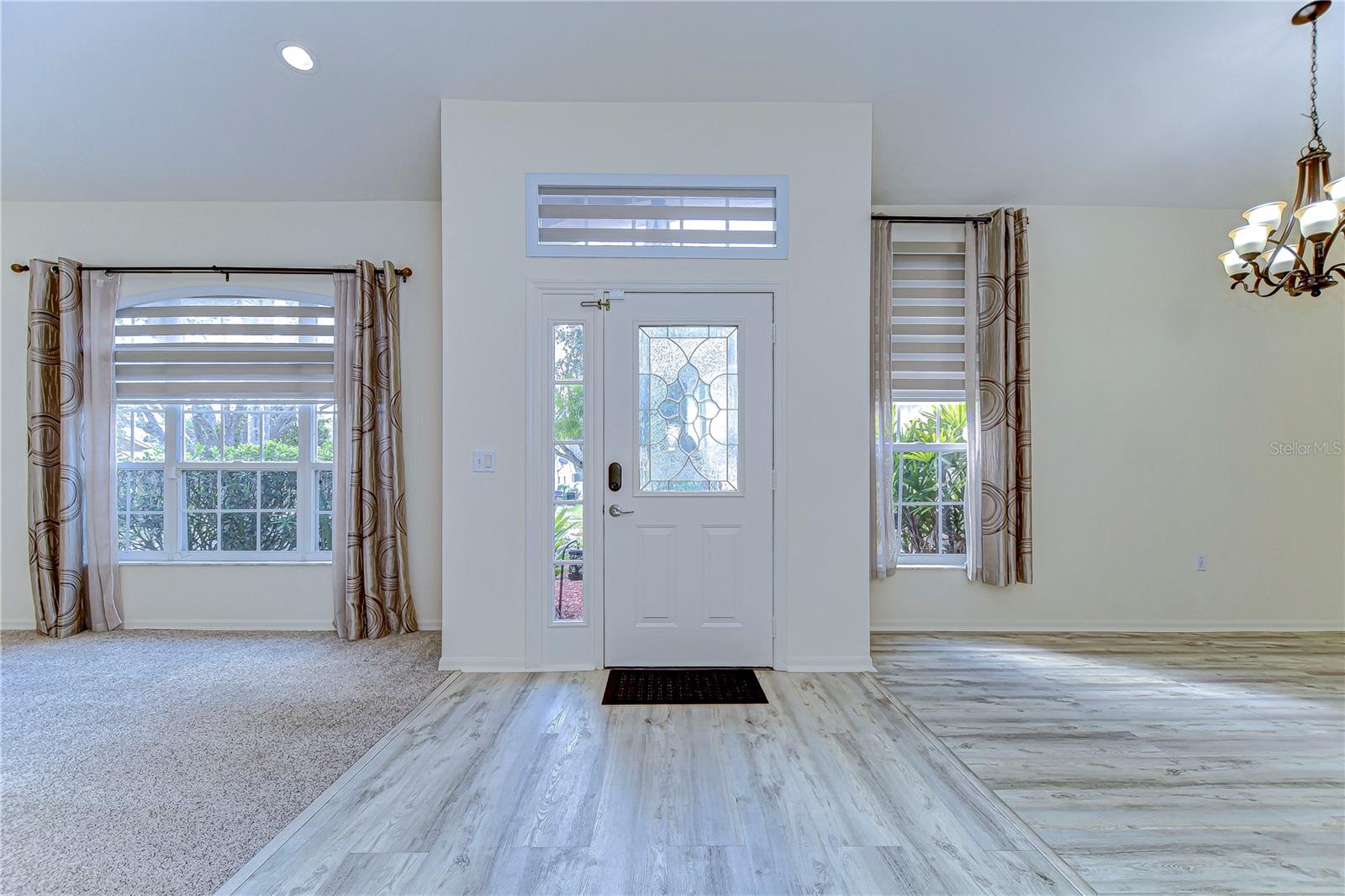 Elegant entrance with abundant natural light.