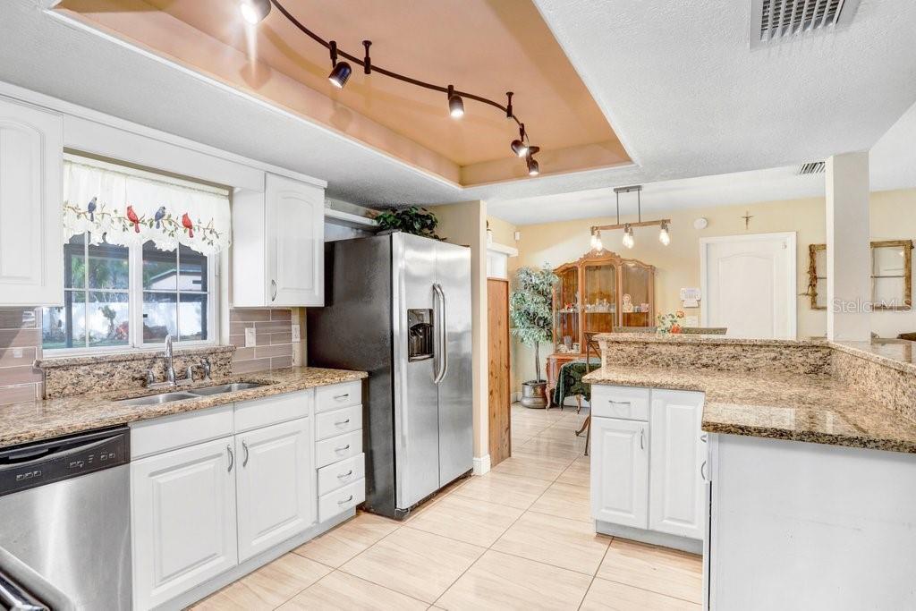 Beautiful Kitchen with granite countertops and SS appliances