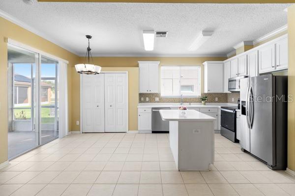 Kitchen. View to Back covered Porch