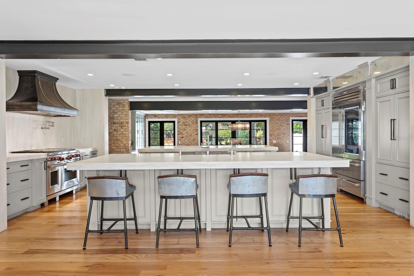 Oversized thick marble counters and surround.