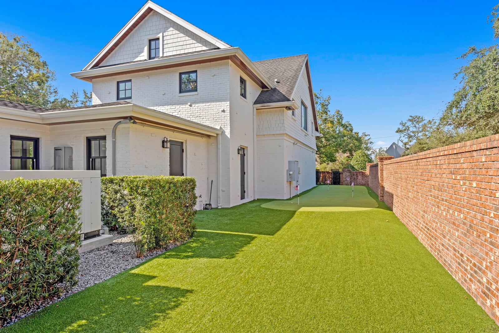 Putting green on north side of property.