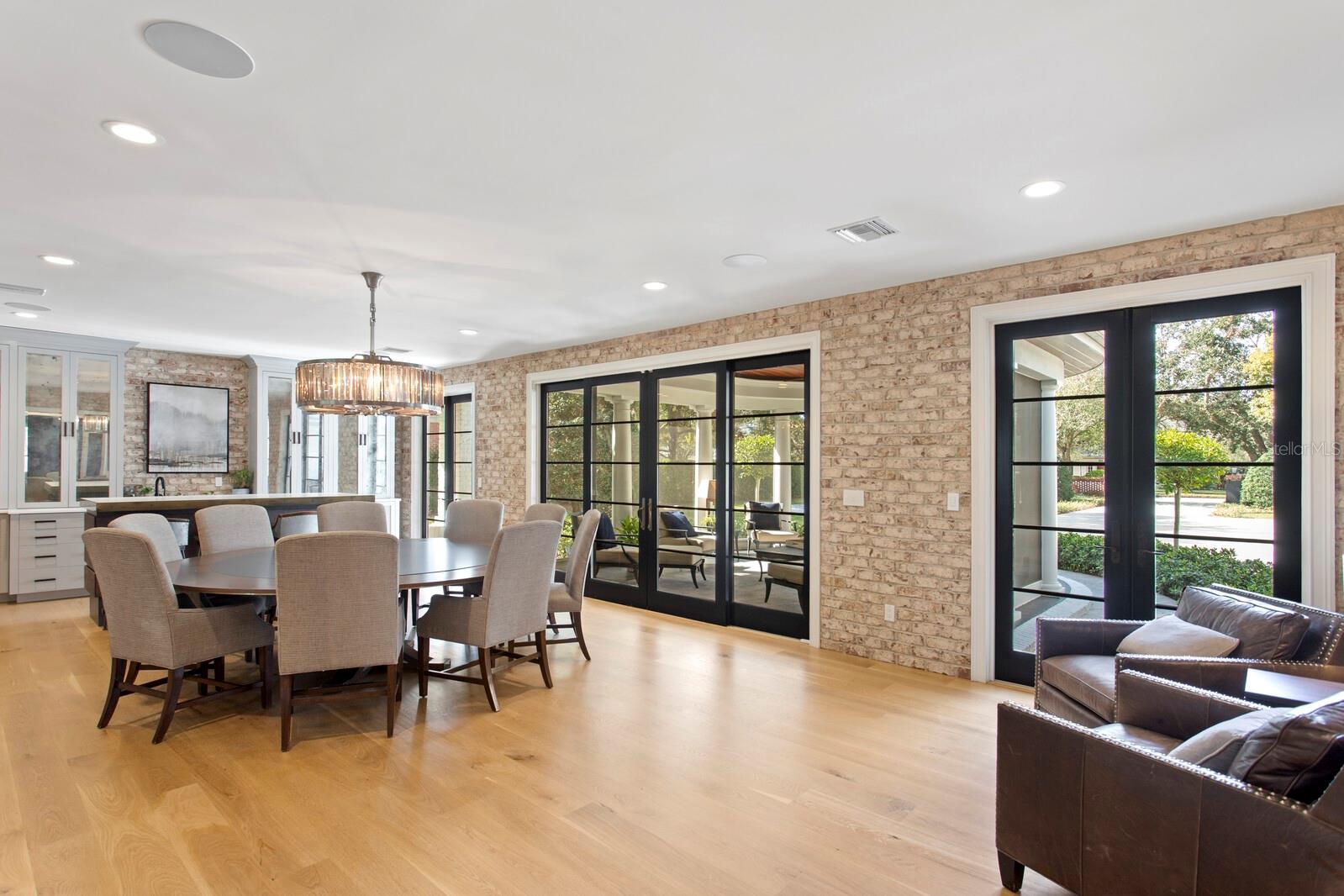 Oversized dining room with doors to front lanai.