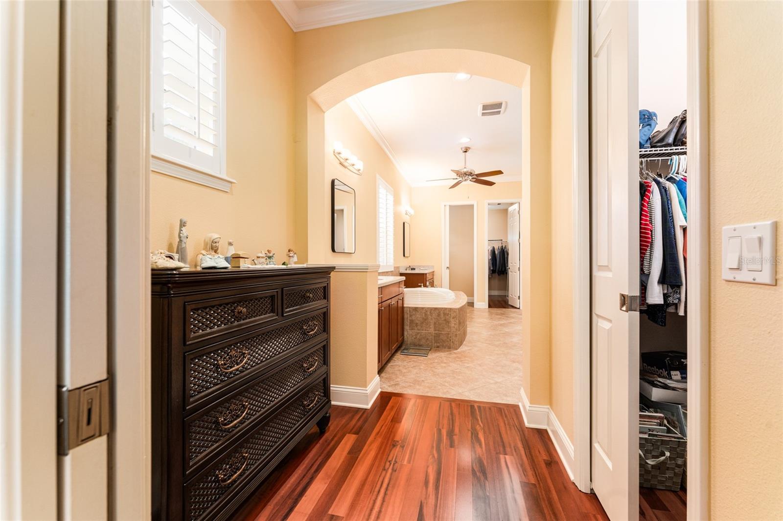 Entrance to Primary En Suite Bath with Pocket Door For Privacy