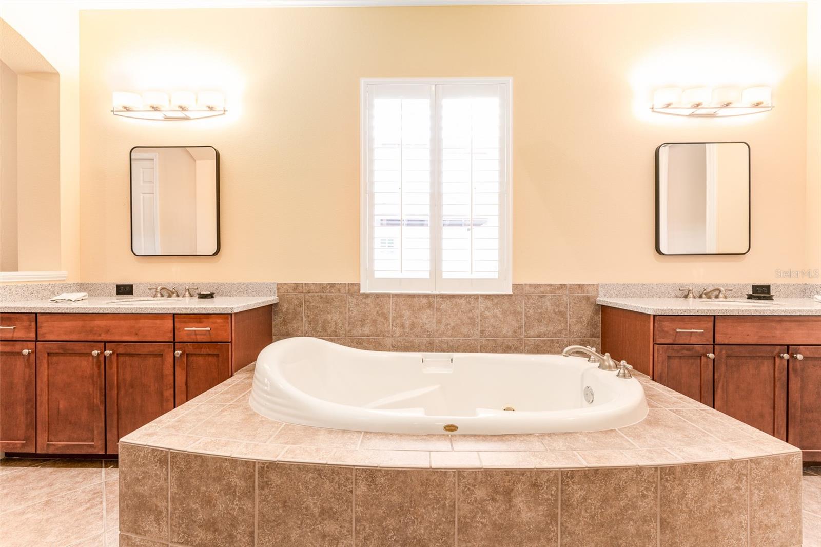 Primary En Suite Bath with Dual Vanities & Jacuzzi Soaking Tub