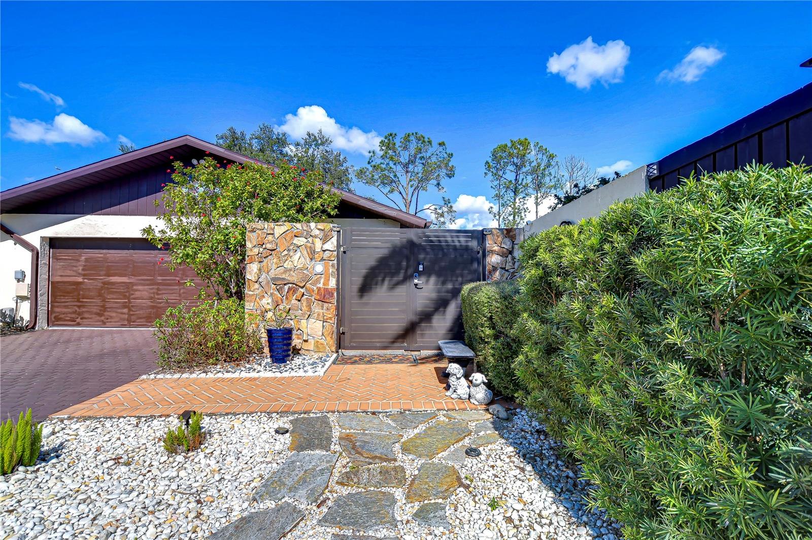 Exterior Front with Double Courtyard Driveway and Entrance