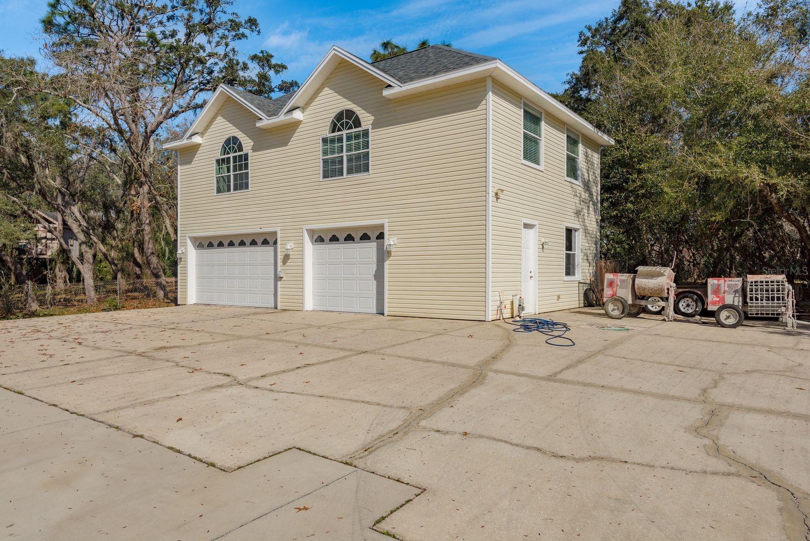 Detached 4 car garage.