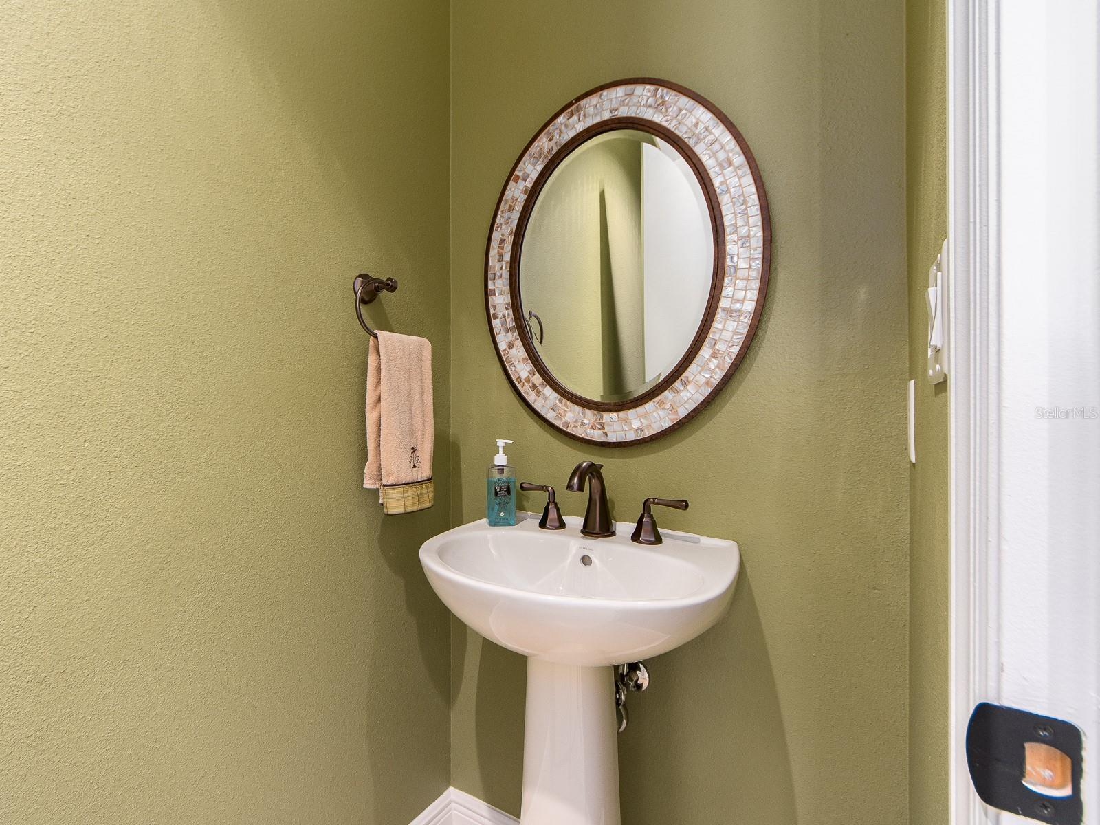 Powder room across from Laundry