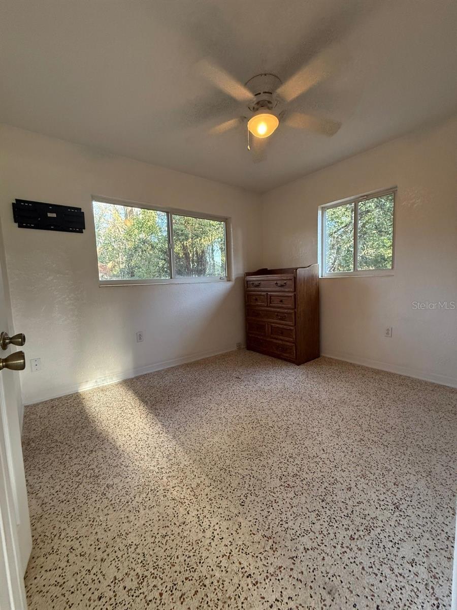 Bedroom 1 with 1/2 bath & walk in closet