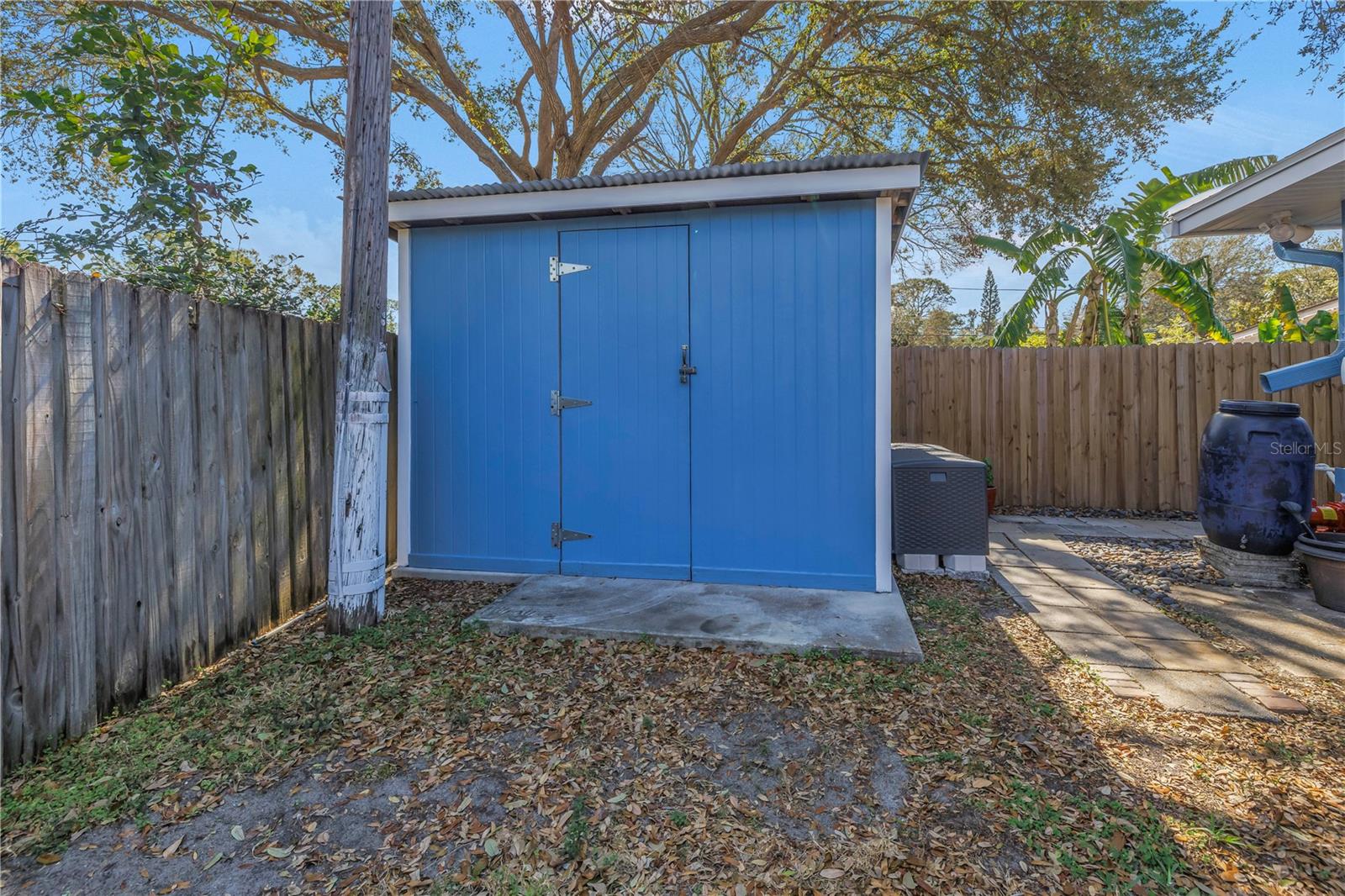 Shed on Concrete Slab is spacious for storage and solid metal roof