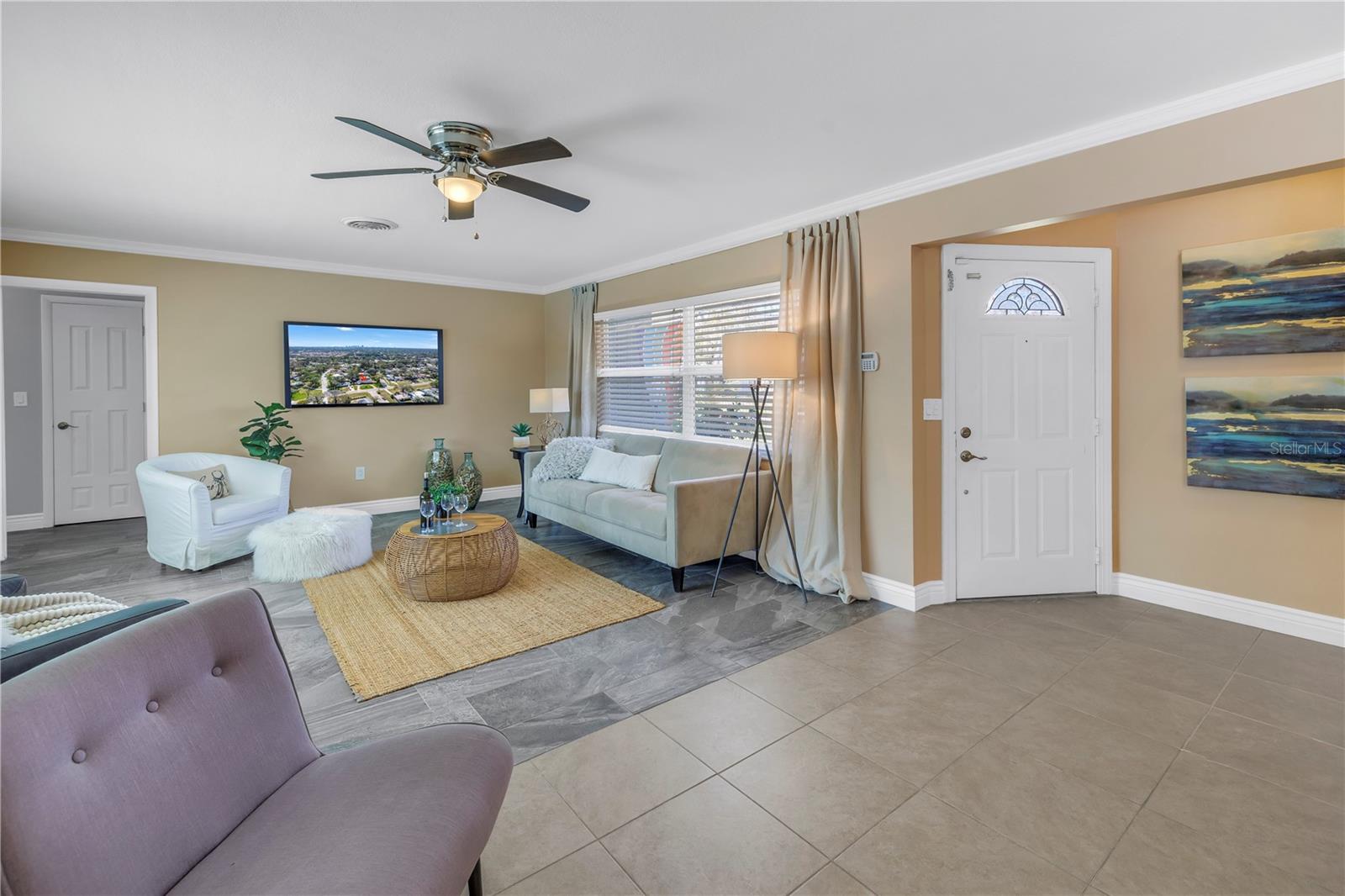 Living Space with focus to the pool and television