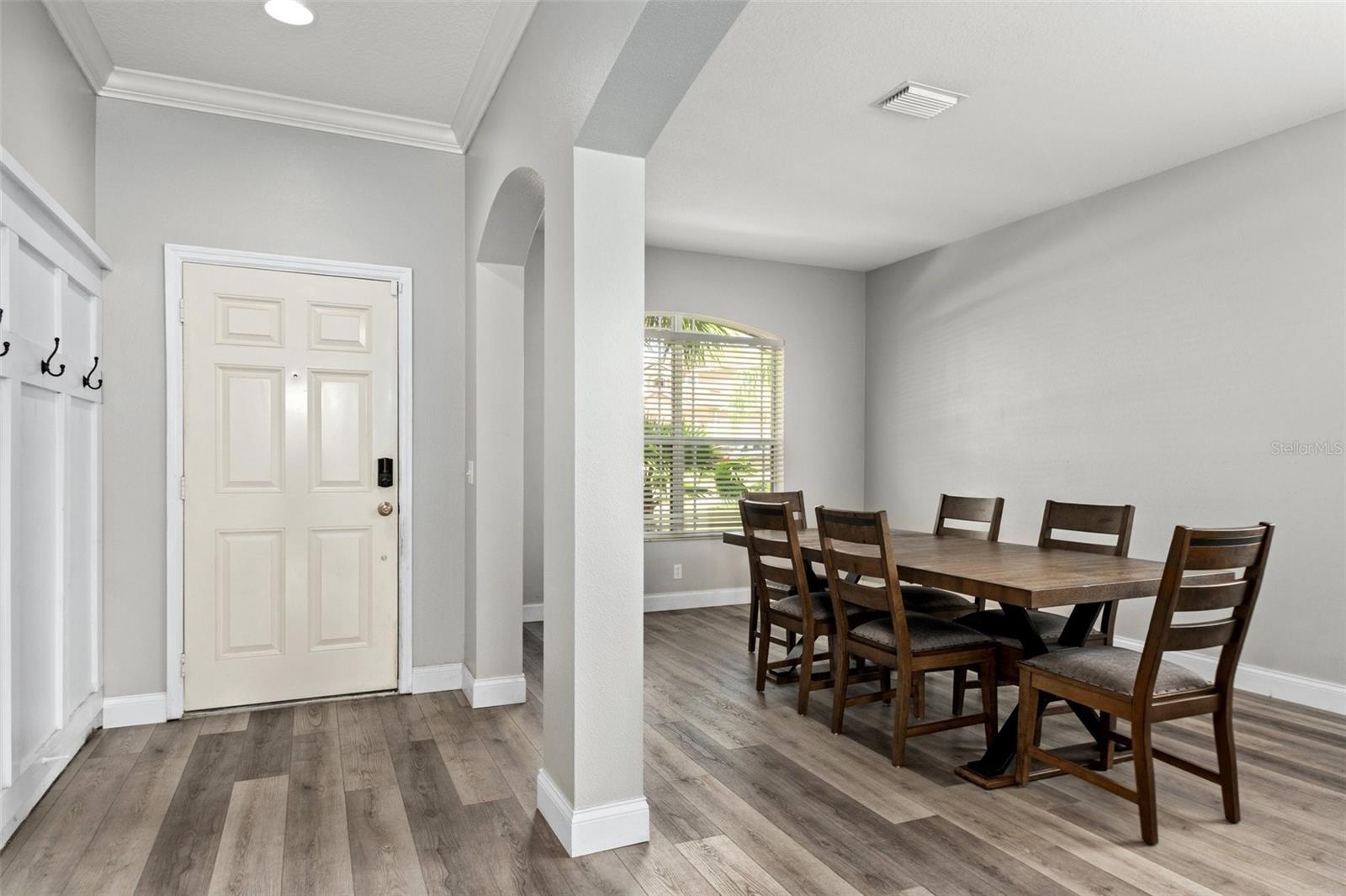 Interior Front Foyer with Custom Wood Work with NEWER Luxury Flooring