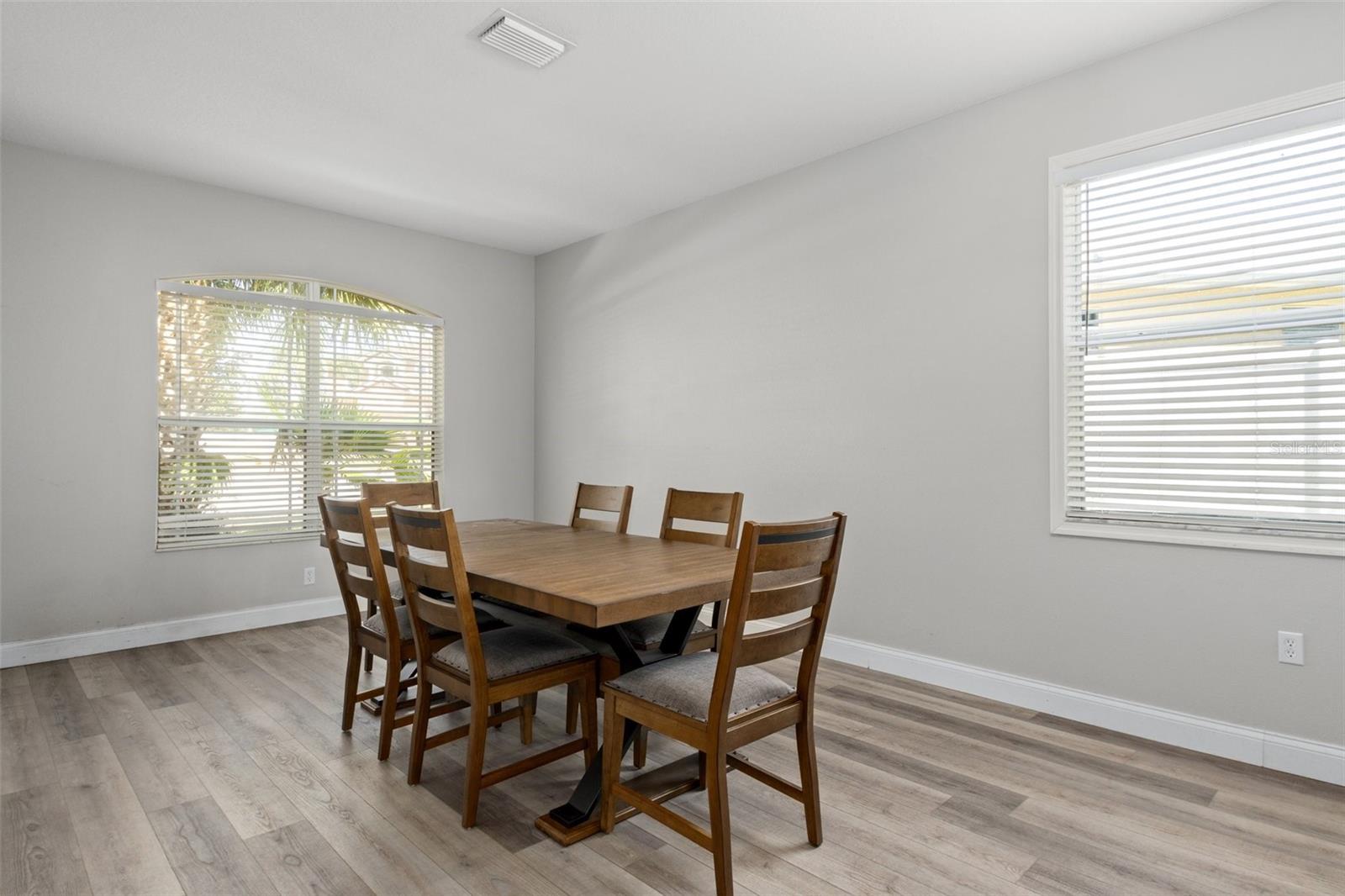 Formal Dining Room with NEWER Luxury Flooring