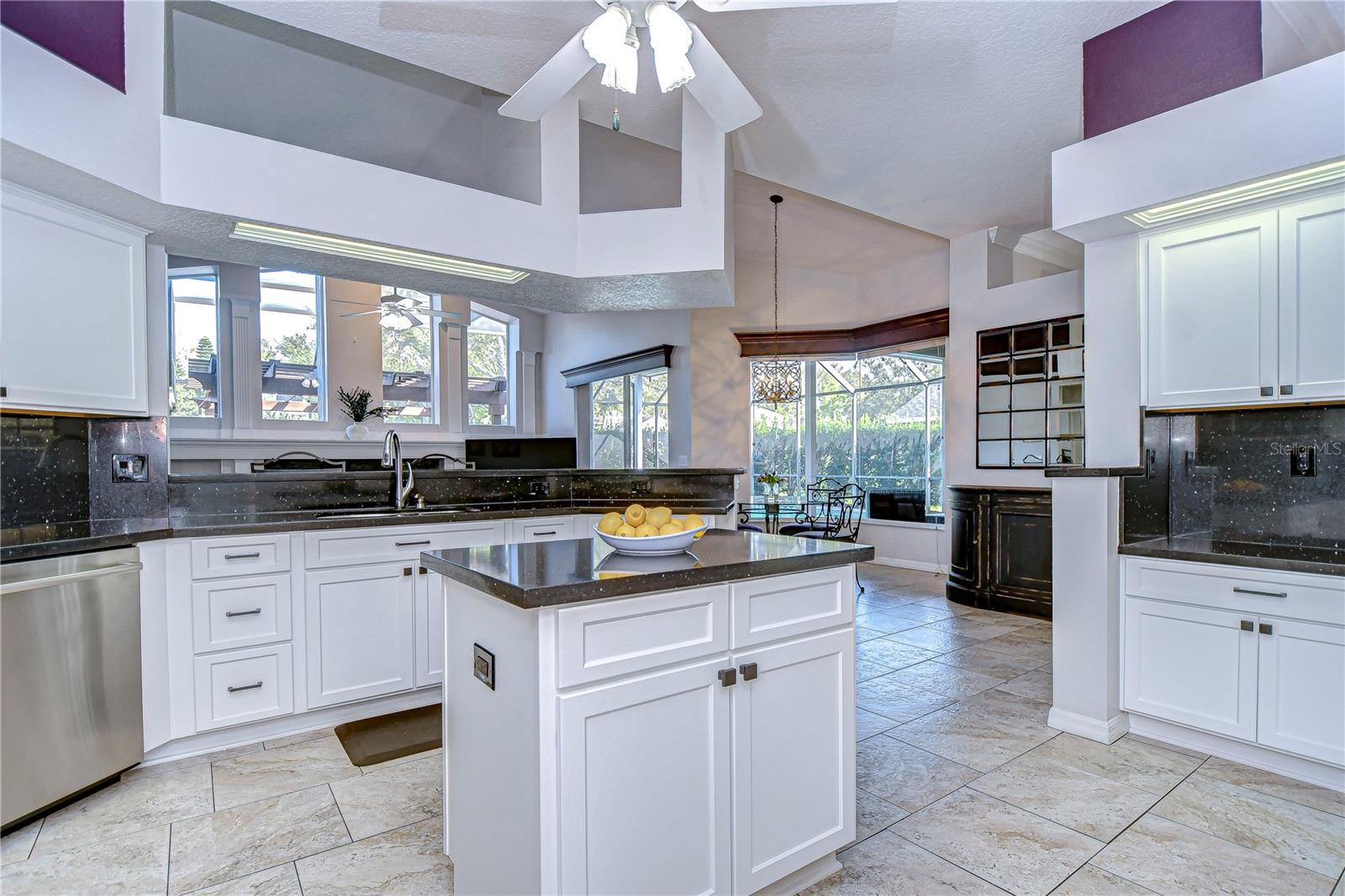 Ideal for entertaining, kitchen seamlessly connects to a sunlit dining area