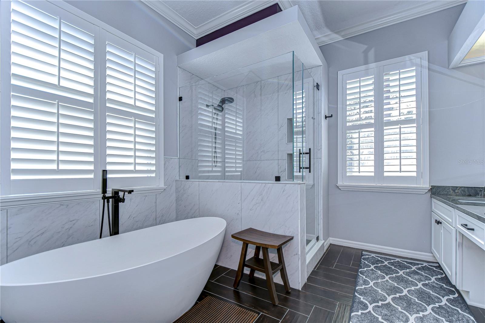 Soaking tub and expansive shower.