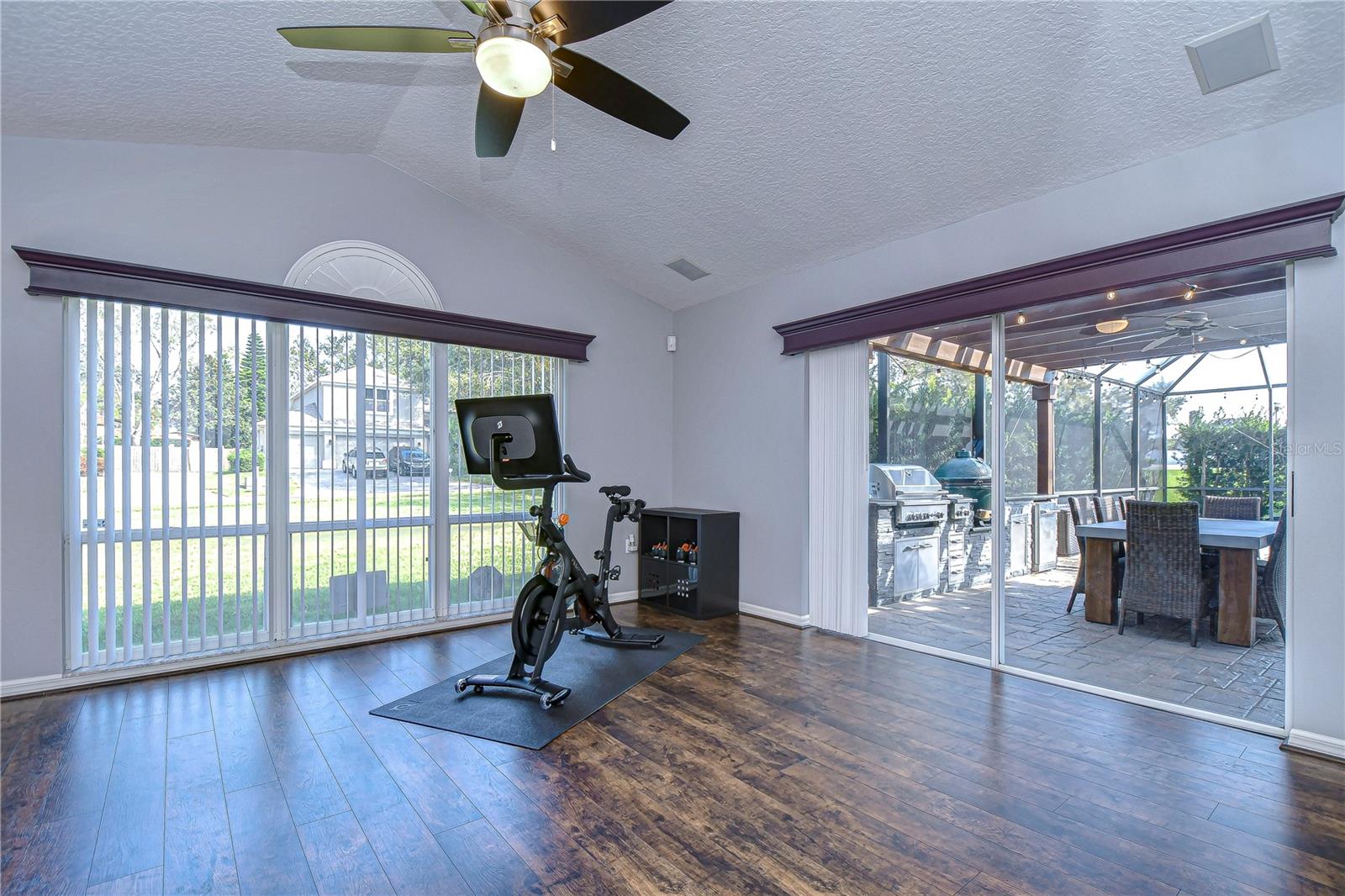 Beautiful windows and sliders highlight the room!