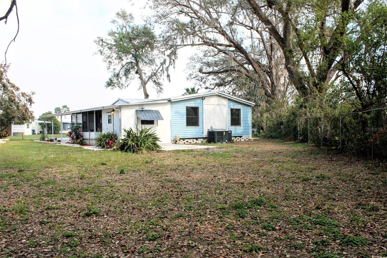 Back of home & backyard