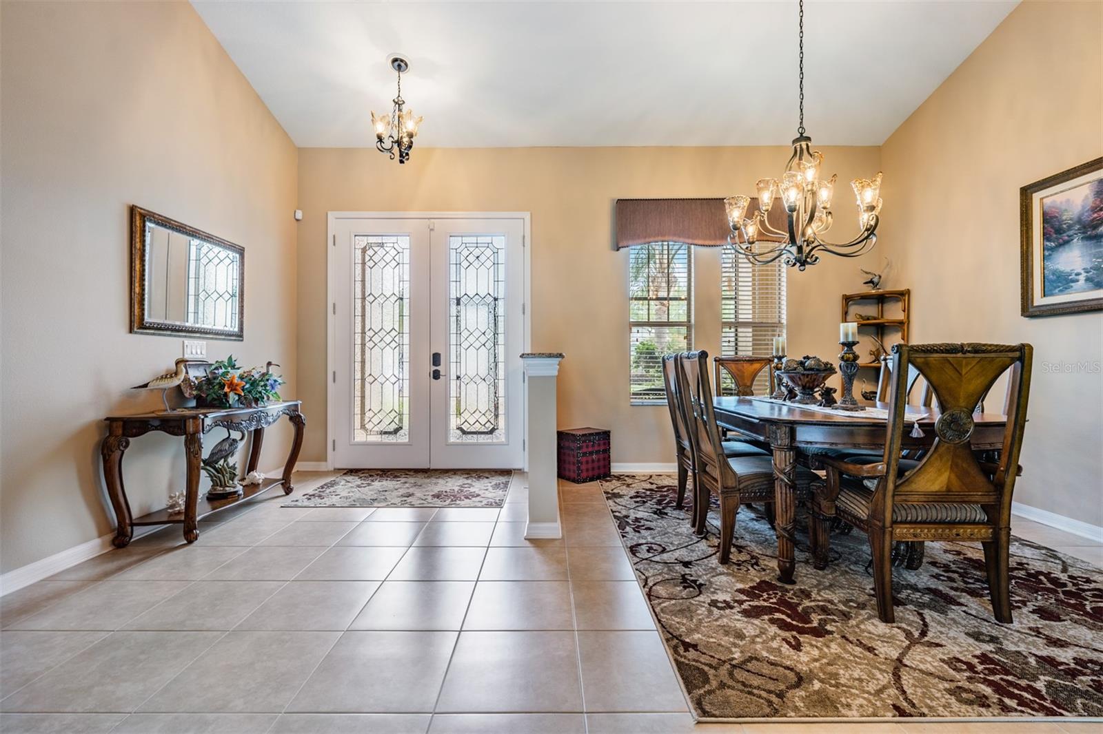 Light, bright Foyer with leaded Glass entry doors