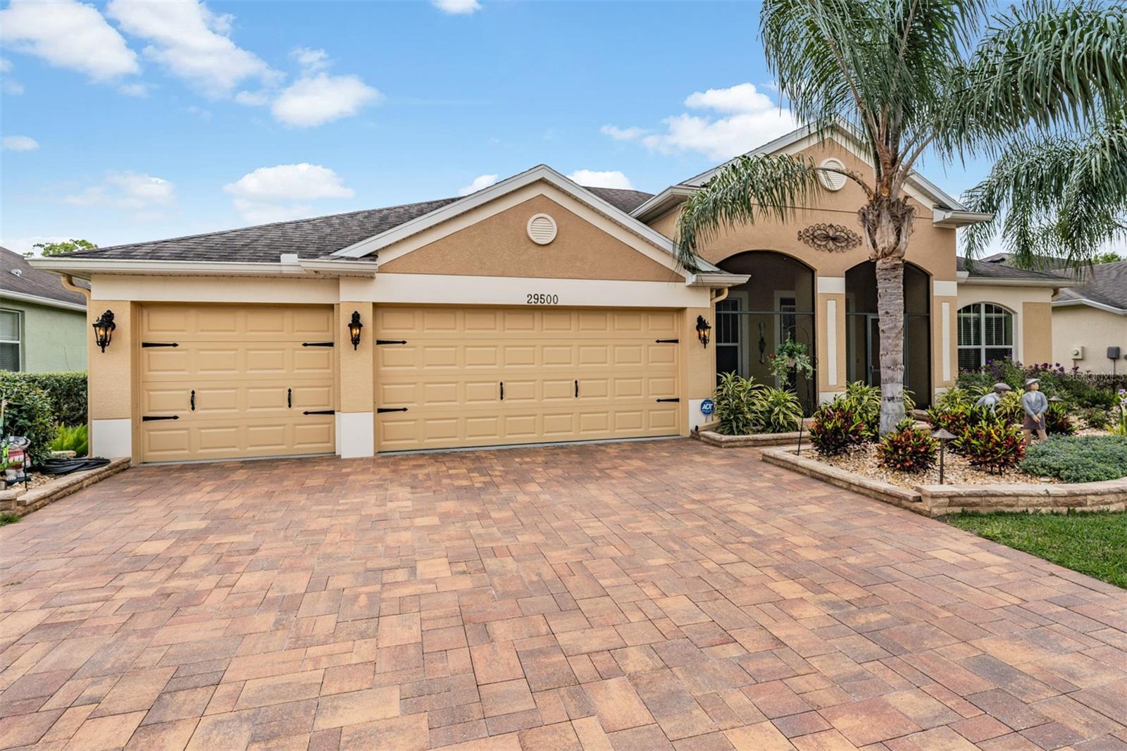 Stunning PAVER DRIVEWAY welcomes you