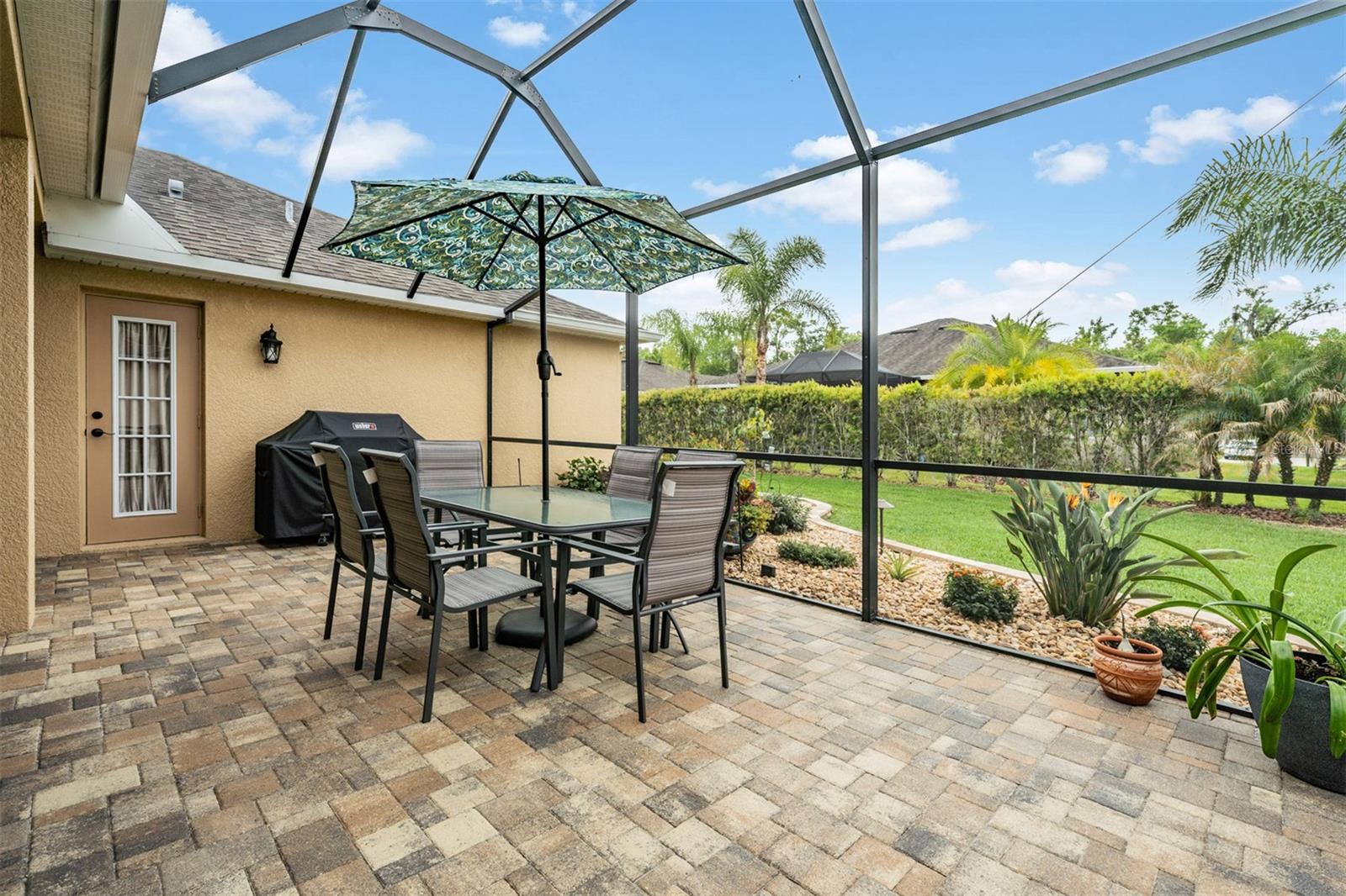 Spacious screened lanai with extended birdcage