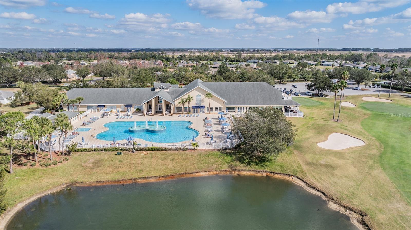 Pond and resort style pool at clubhouse