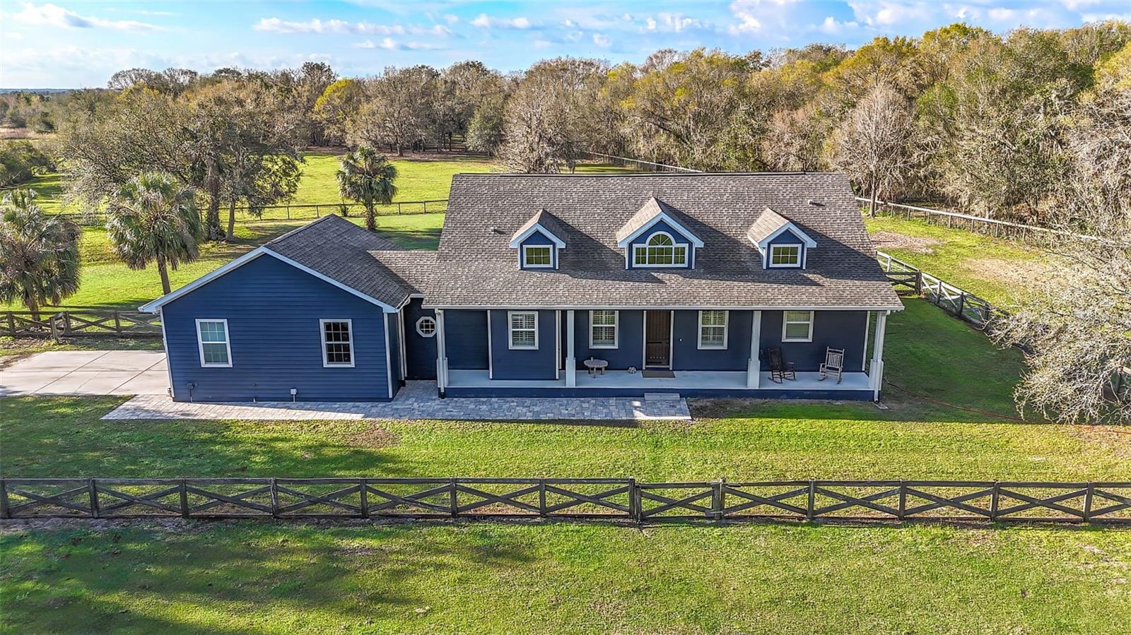 Driveway to house, front pasture, barn, back yard and the start of the back pasture.