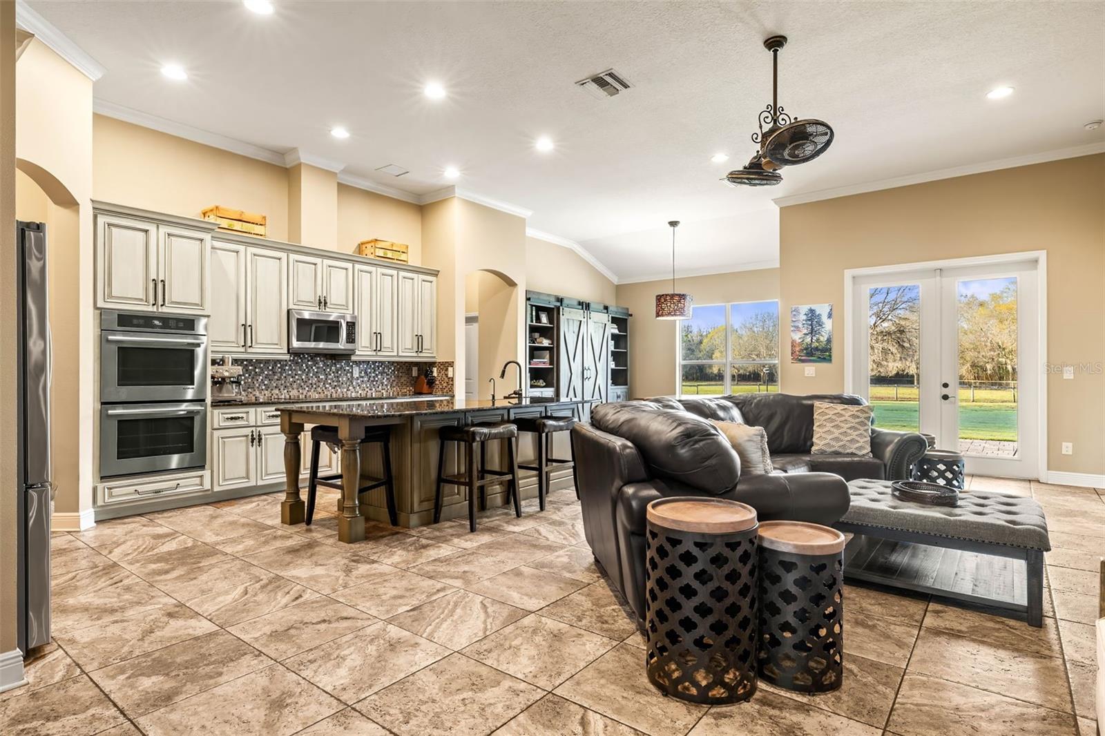 Photo from hallway towards kitchen, dining, living area