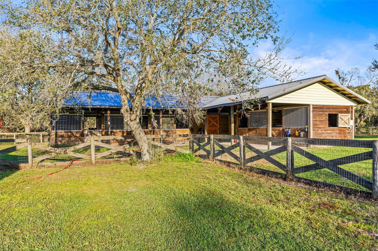 5 stall barn complete with fans, gutters, tack room and feed room.