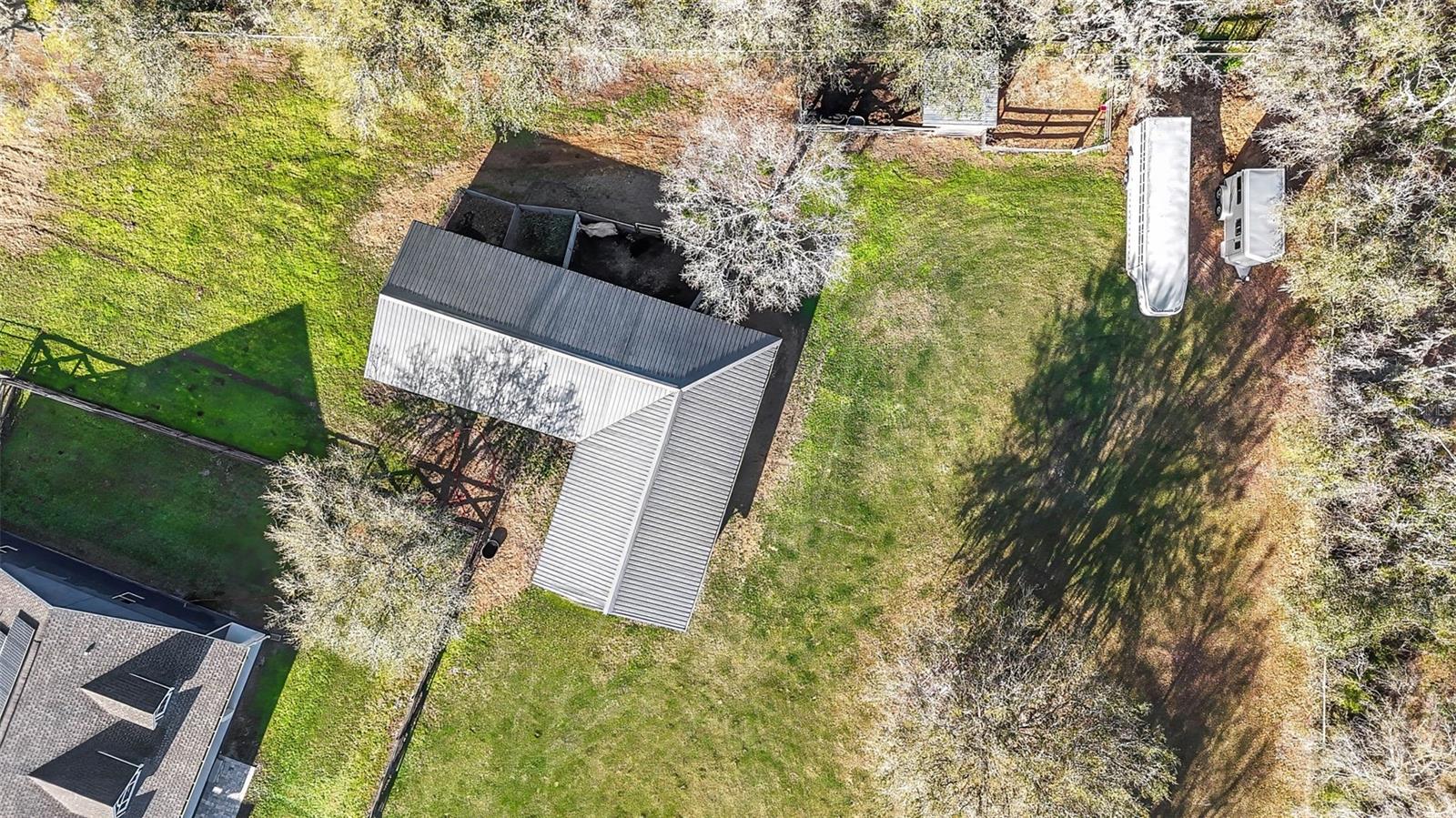 Aerial of barn and additional fenced runs and shelter.