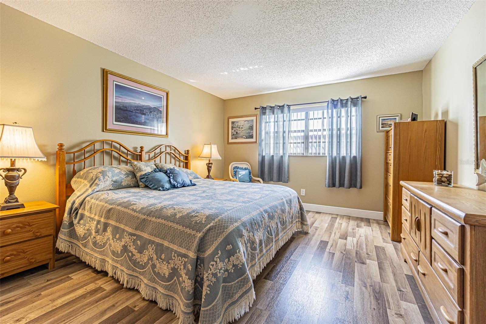 Beautiful neutral flooring!  There is a large walk-in closet for plenty of your personal items.