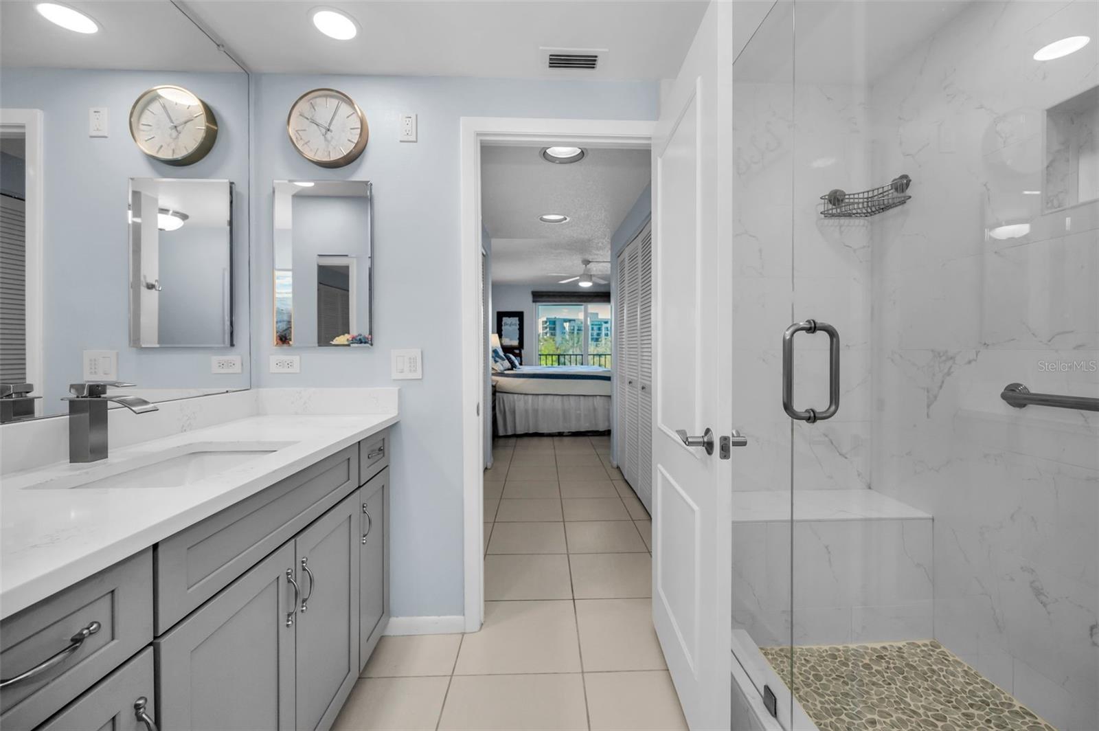 Lovely master bath, with quartz countertops and all the details you would expect, plus more!