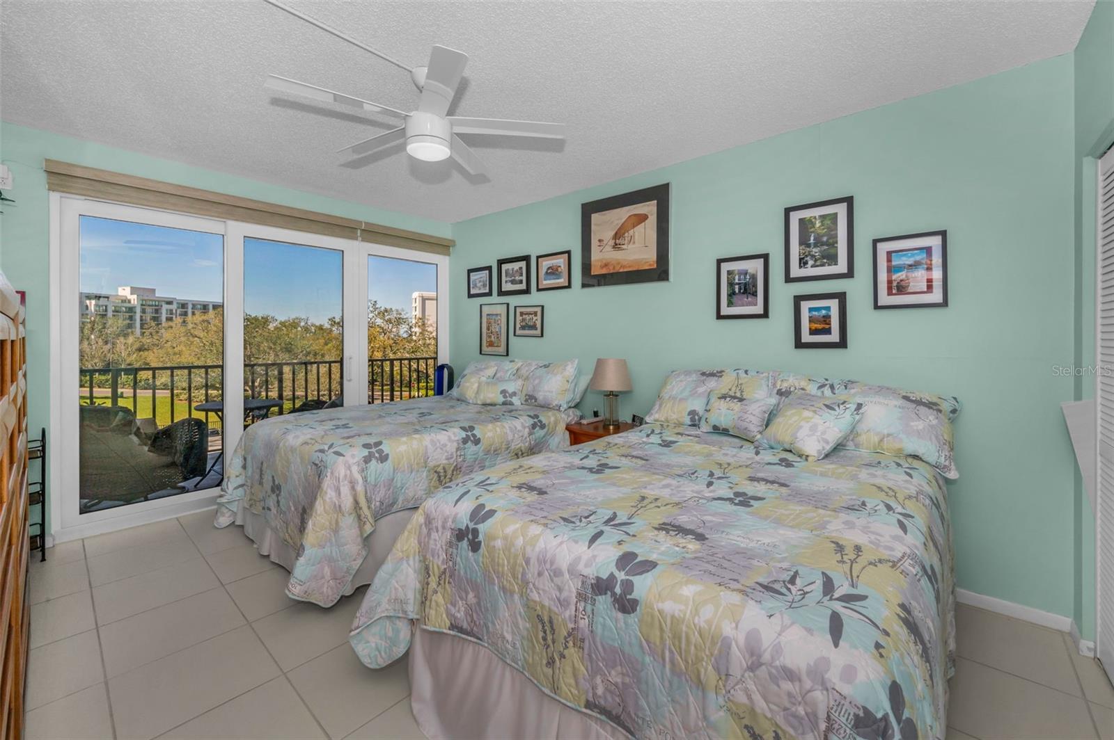 Bedroom #2 holds 2 queen beds and has an 8' closet and newer hurricane rated doors all around!