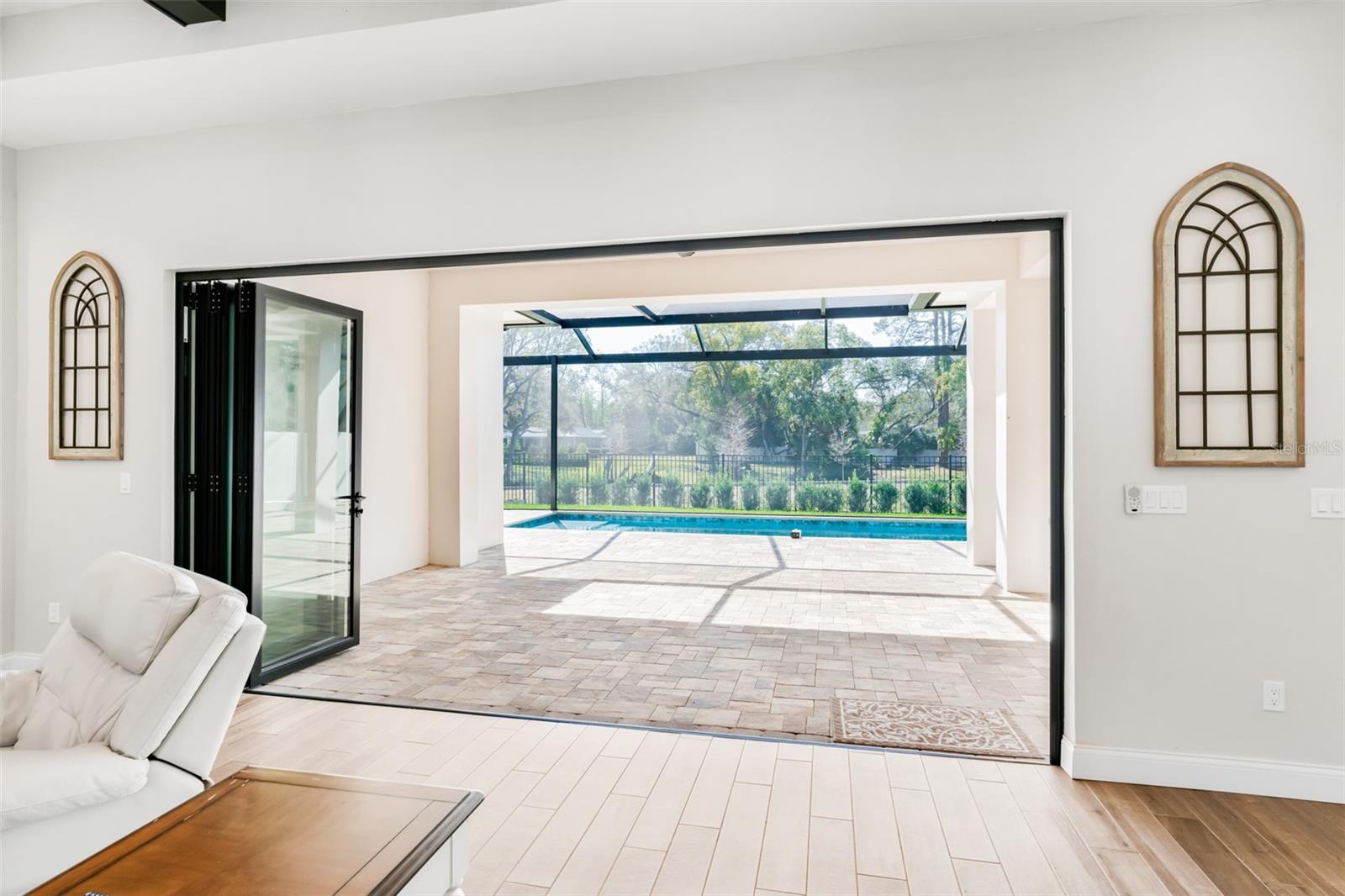 Gorgeous Accordion doors leading to the covered patio