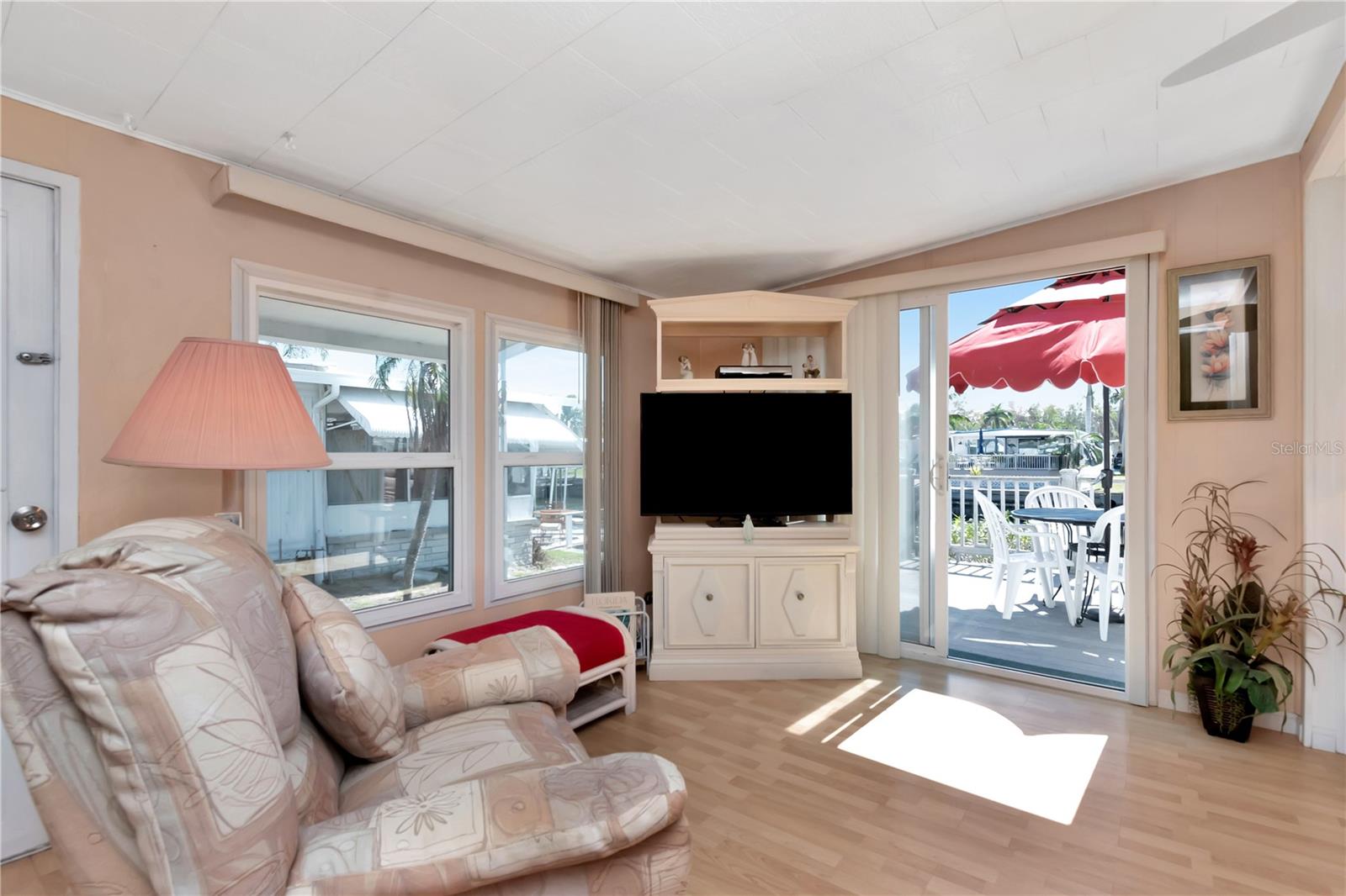 Living / Great Room with additional oversized sliding doors and large windows with amazing water views.