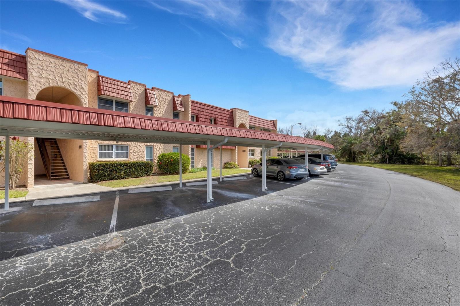 2 Covered Parking Spaces at Your Front Door on the Canal