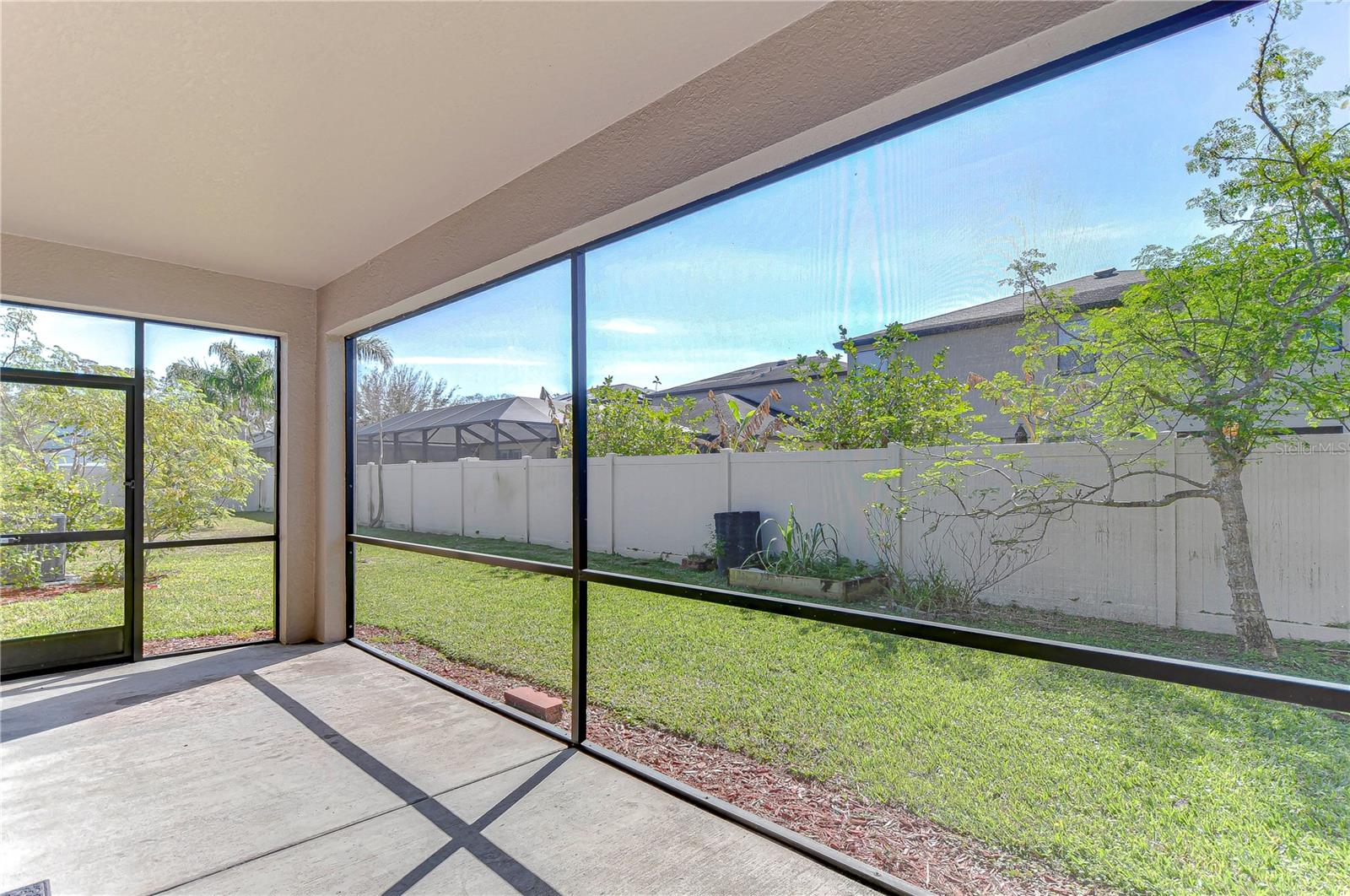 Relax in your private screened lanai, perfect for sunny Florida days