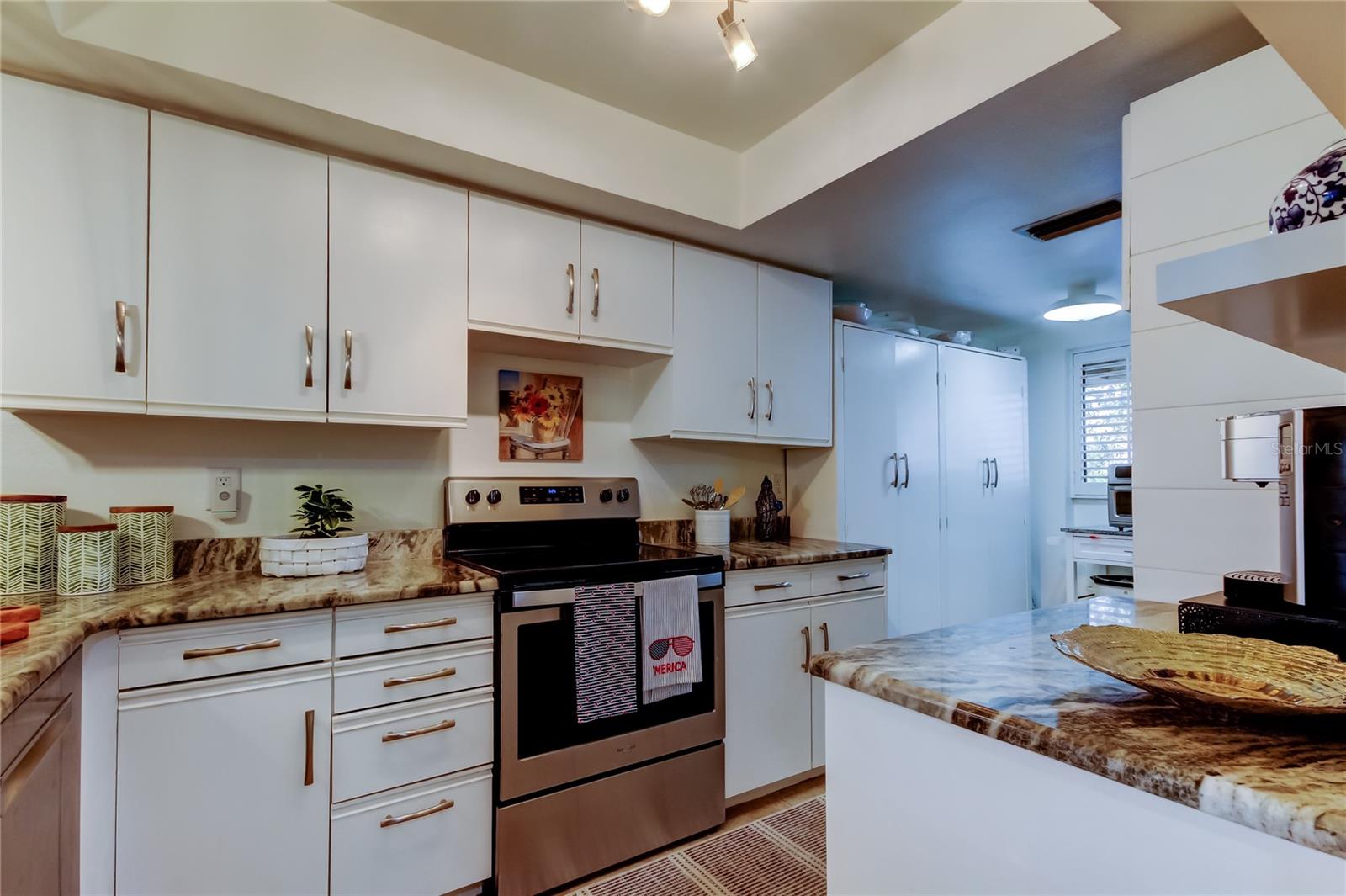 Kitchen with extra tall cabinets