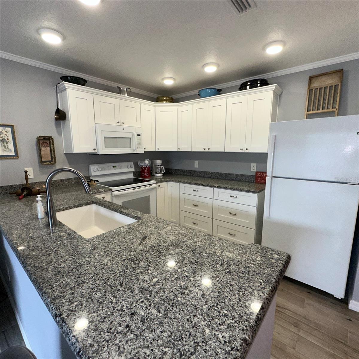 Shaker cabinets with granite counter tops