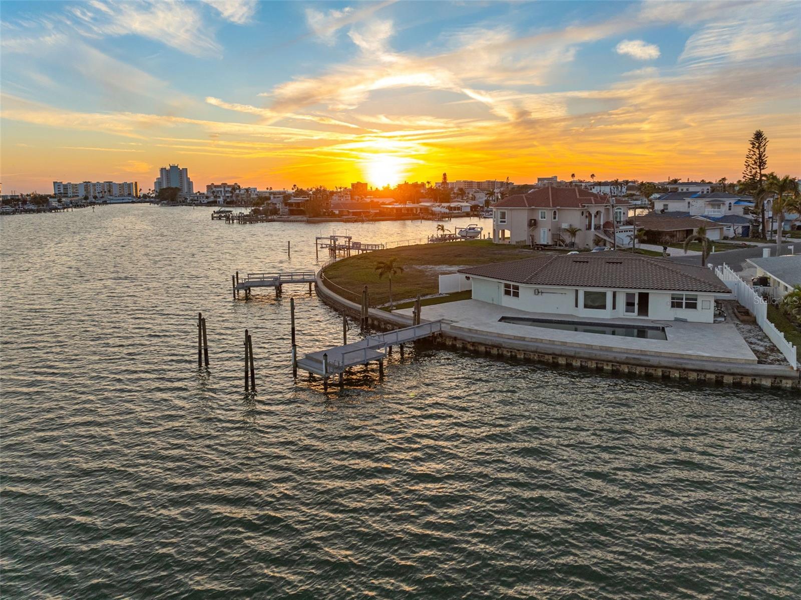 105' of waterfront includes a new seawall, composite dock and pool.