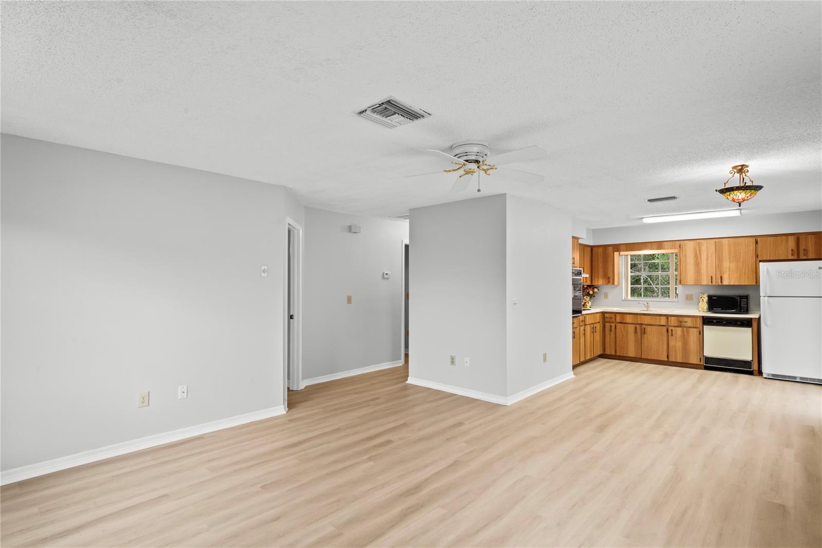 Interior view of the condo with NEW LUXURY VINYL throughout the condo.