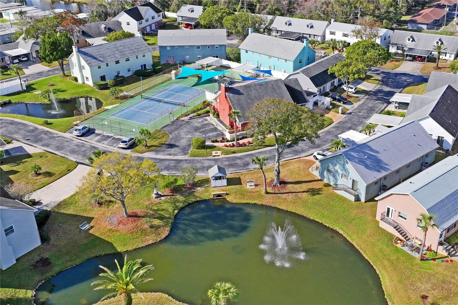 This view is of the amenities and the pond.