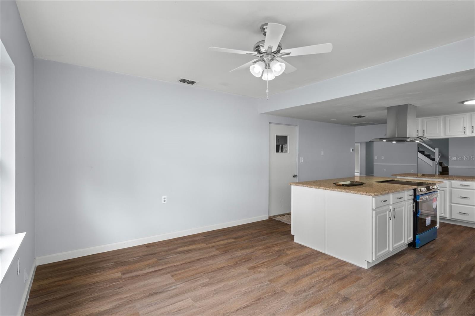 This is a view of the eat-in kitchen looking into the kitchen