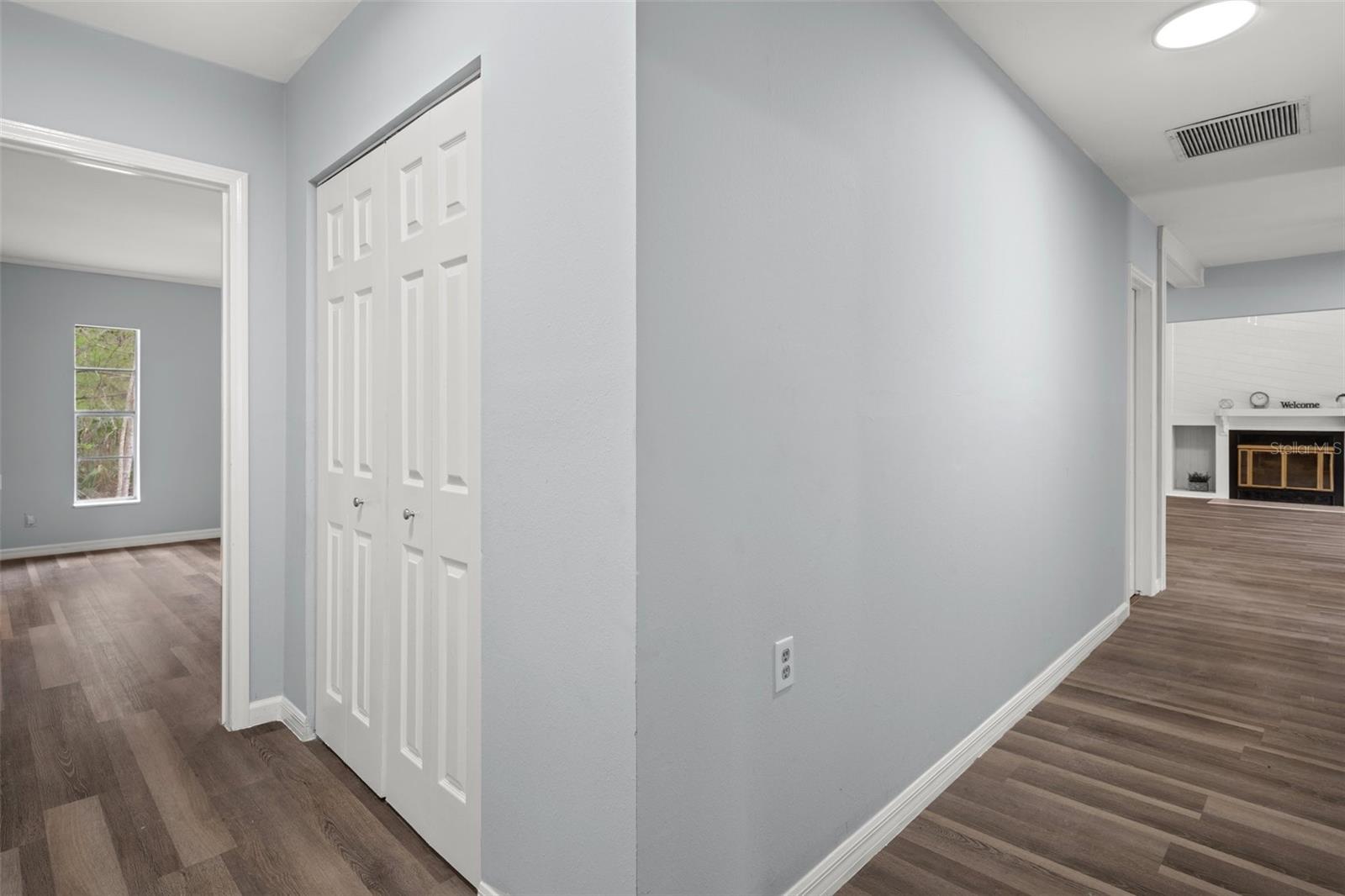 Linen closet and doorway to the master bedroom