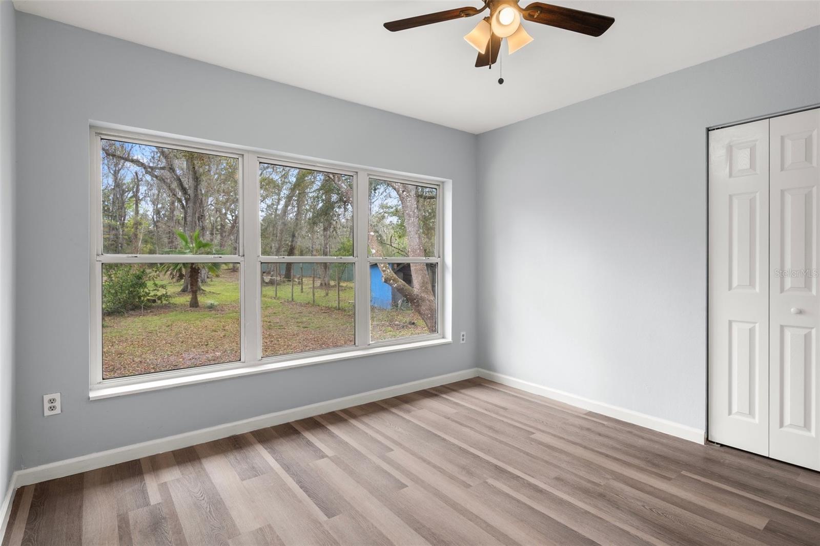 Bedroom Three has a new fan/light overlooking the front yard