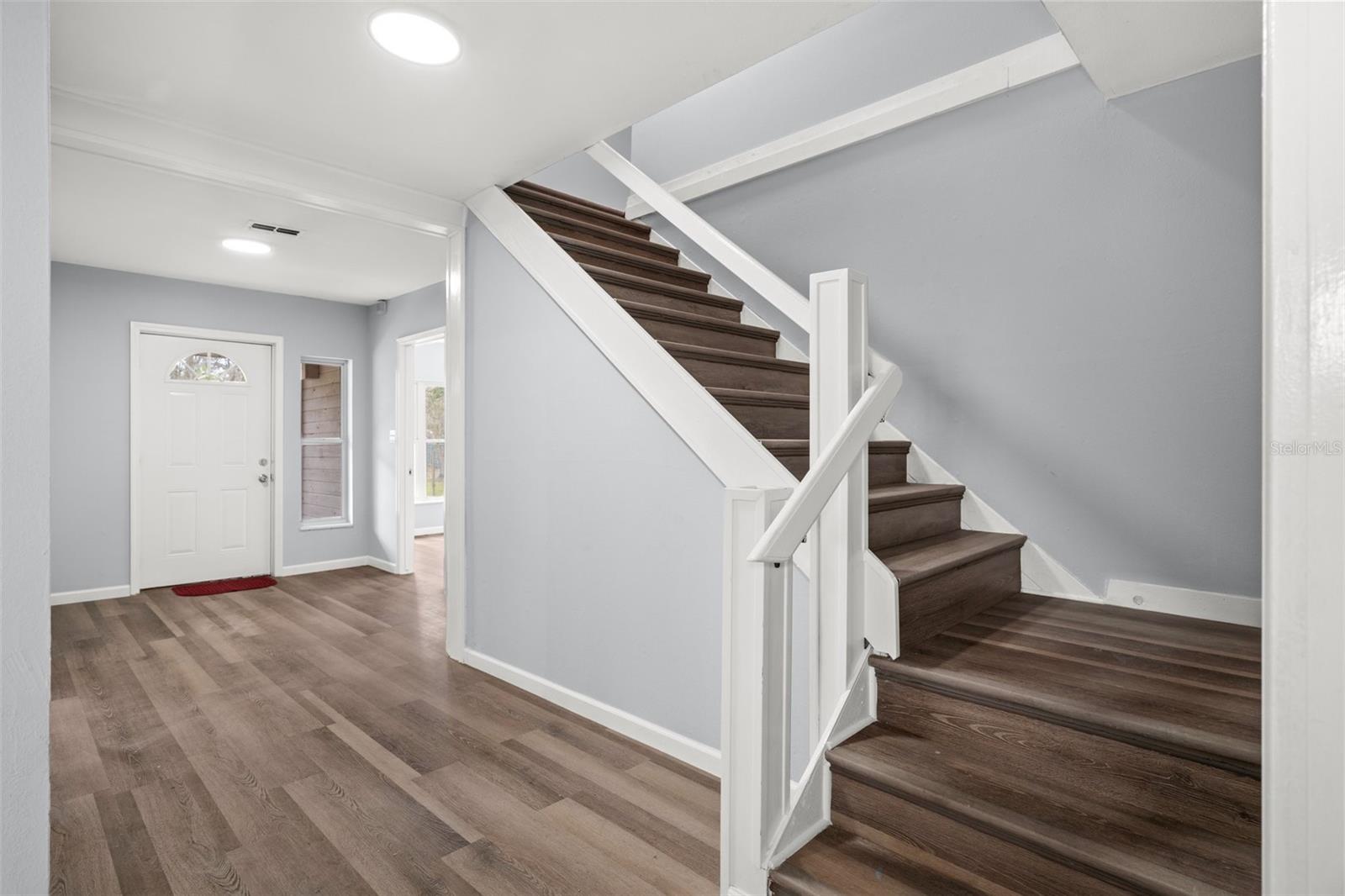 Stairs to second story guest suite with its own full bathroom