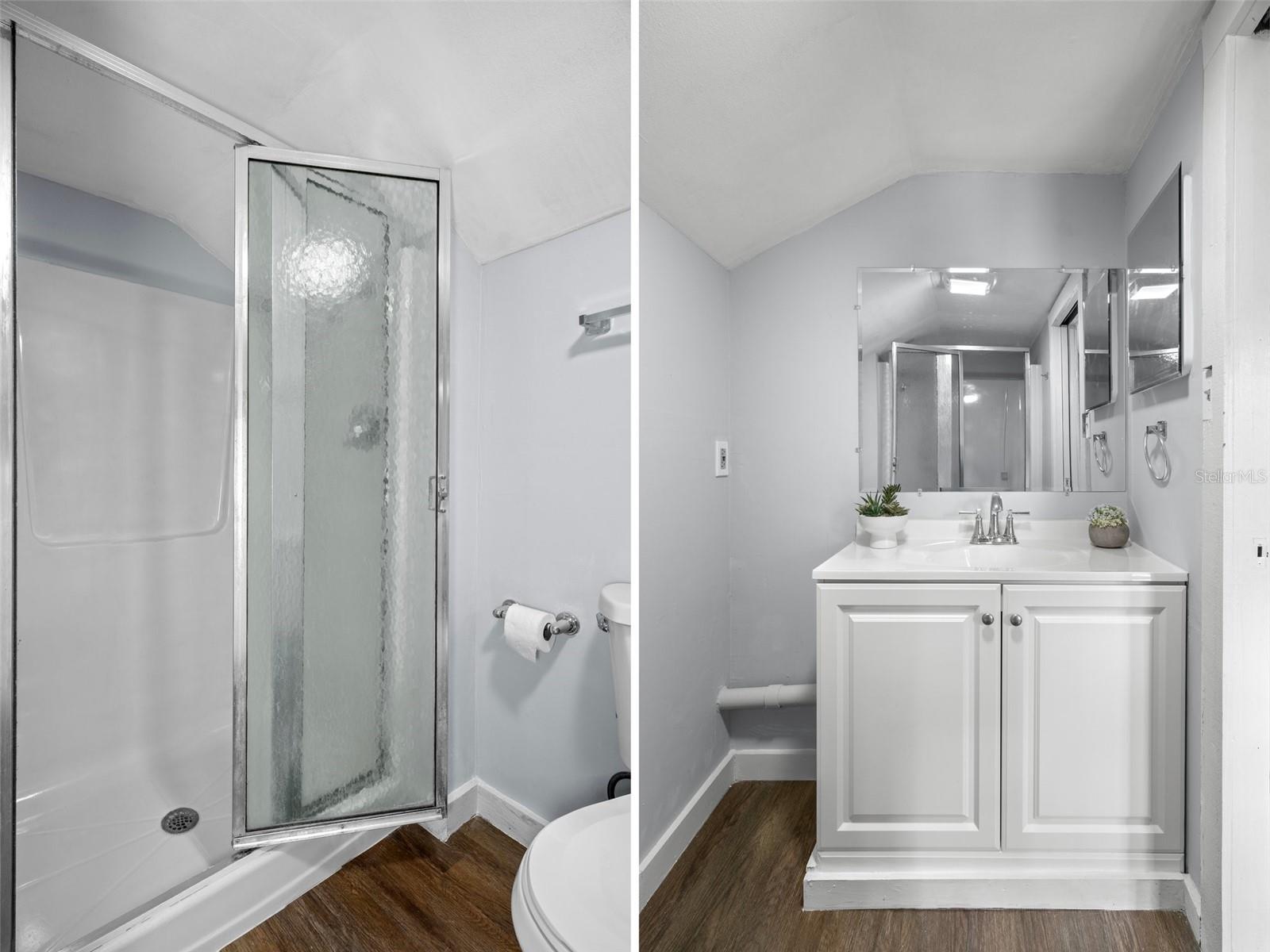 The Full bathroom has a brand new vanity and step-in shower